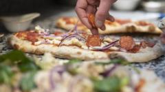 Robotic pizza makers struggle to meet quality and demand
